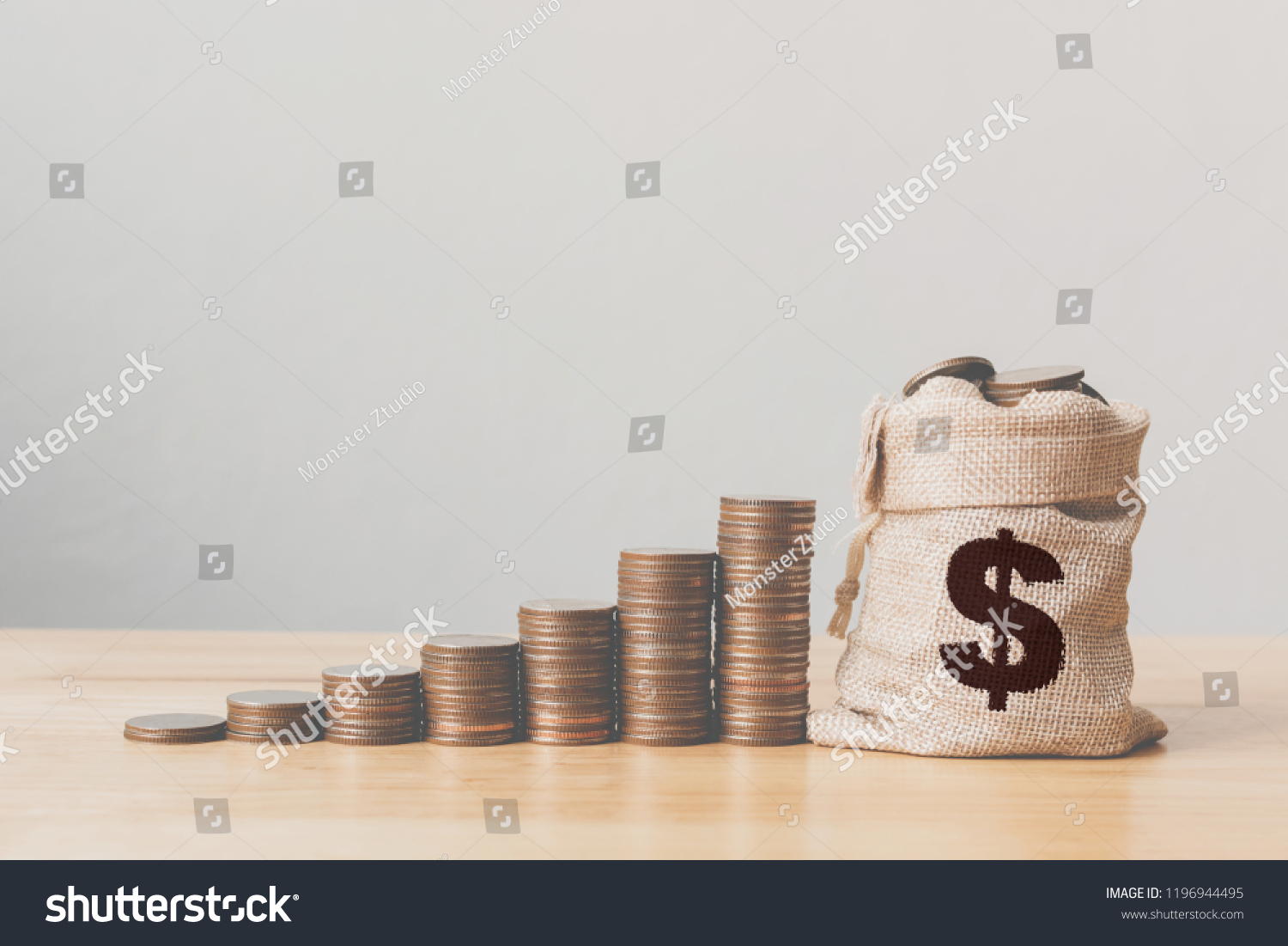 Coins in money bag with coin stack step growing growth saving money, Concept finance business investment #1196944495