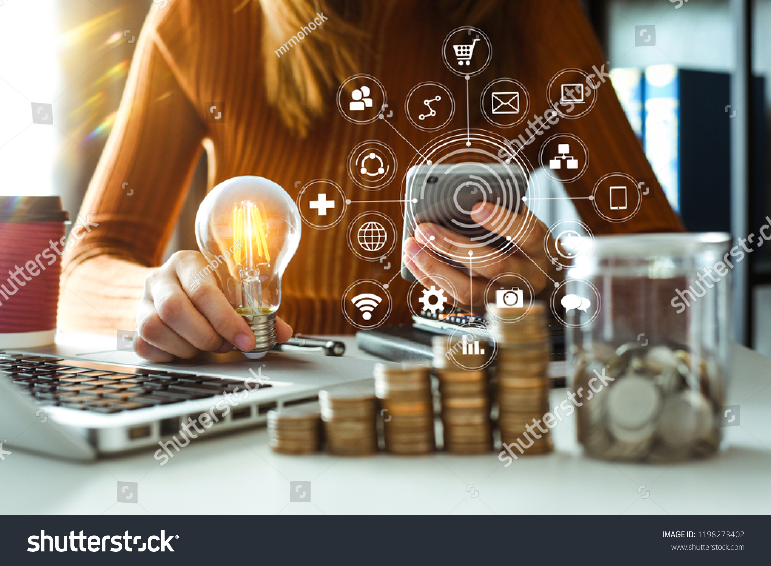 business woman using smartphone, tablet and holding light bulb, with using smartphone concept idea with innovation and creativity VR icon
 #1198273402