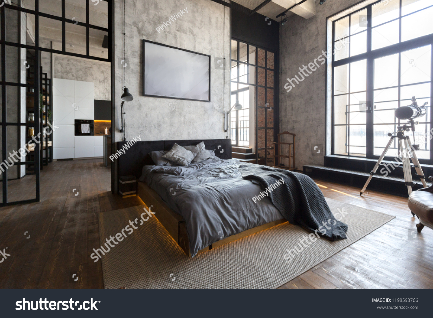 luxury studio apartment with a free layout in a loft style in dark colors. Stylish modern kitchen area with an island, cozy bedroom area with fireplace and personal gym #1198593766