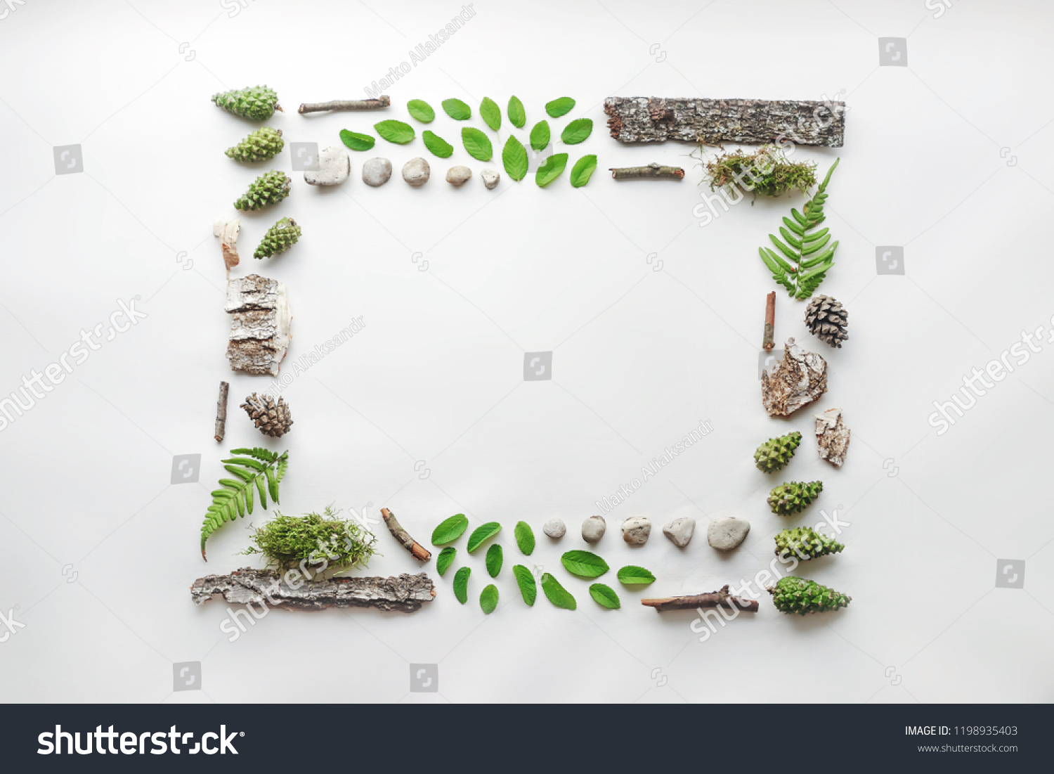 Square frame, Creative layout, natural layout of leaves, stones and wood. Empty for an advertising card or invitation. The concept of nature. Summer poster. Flat lay. Nature background #1198935403