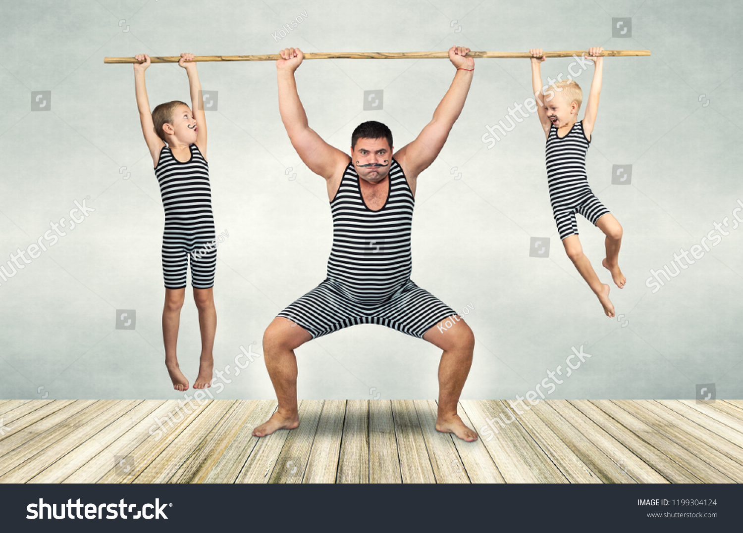 Family of strongman. The father of two sons in vintage costume of athletes perform strength exercises. Family look. #1199304124
