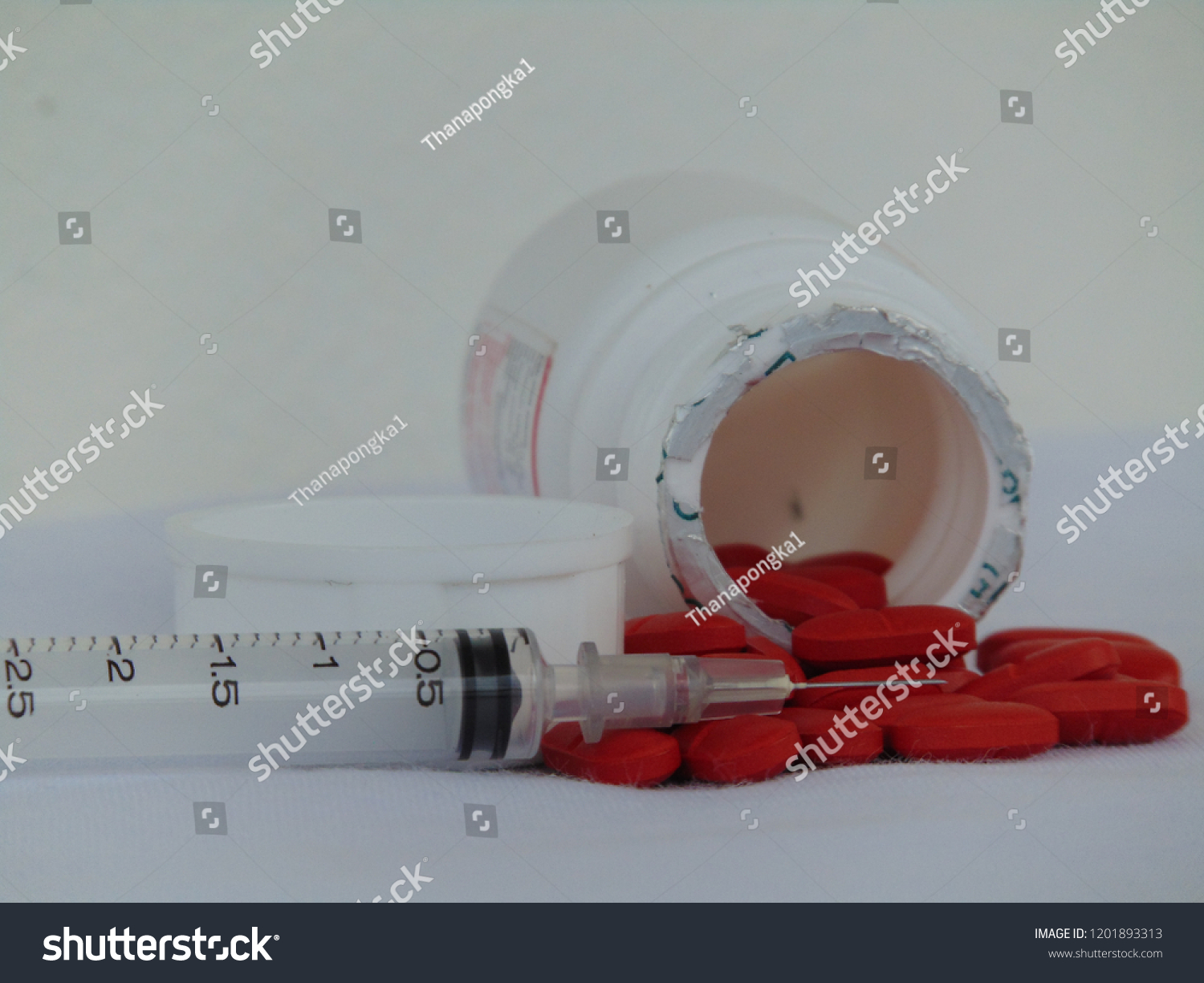 Syringes,medications and thermometer. #1201893313