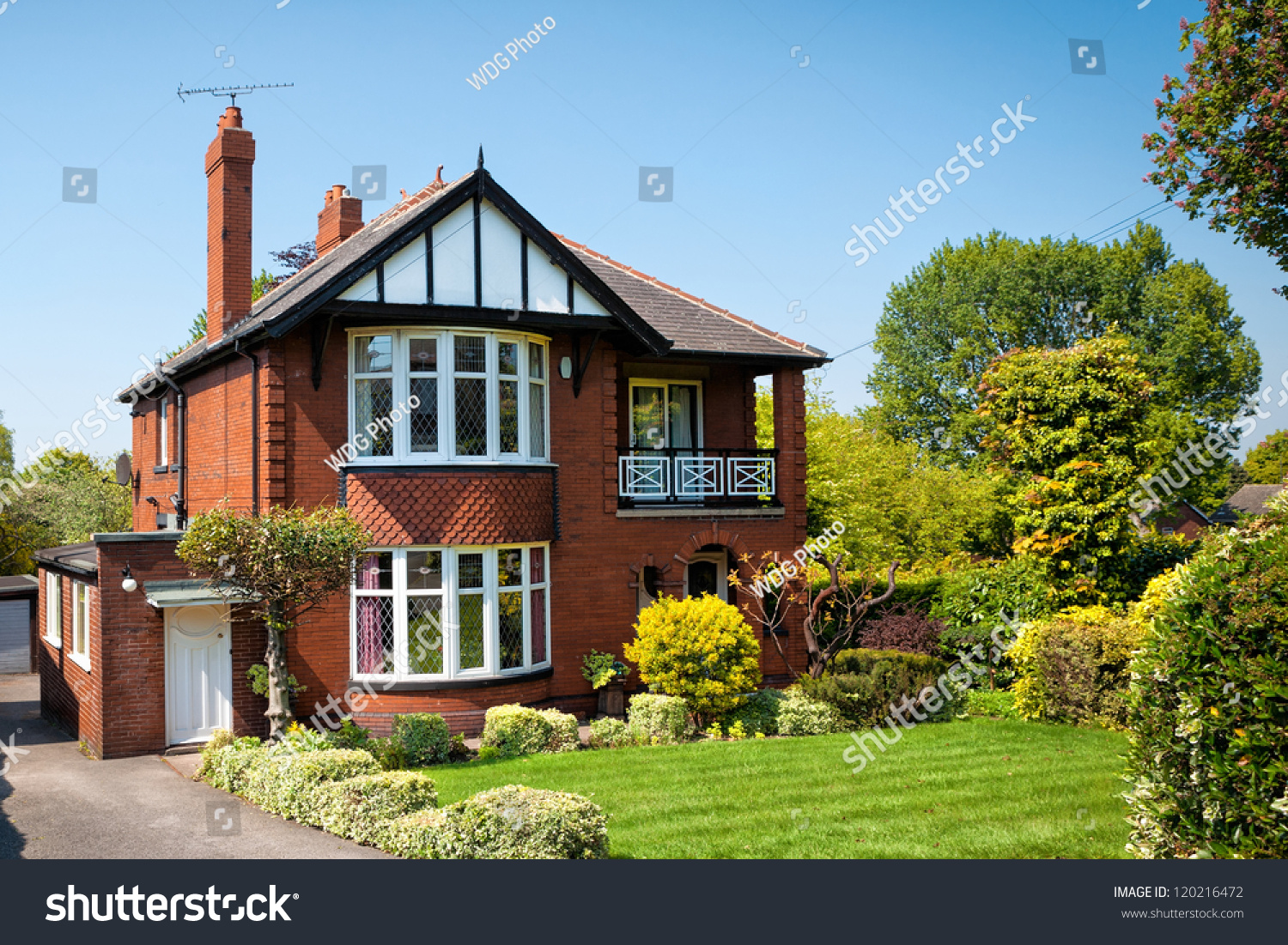 Typical English house with a garden #120216472