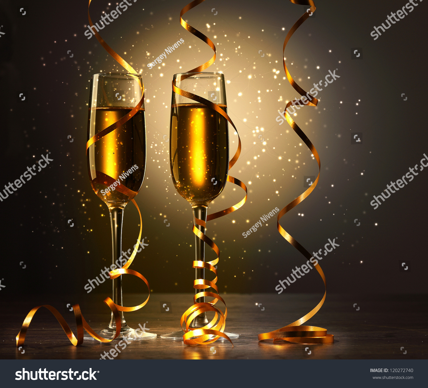 Two champagne glasses ready to bring in the New Year #120272740