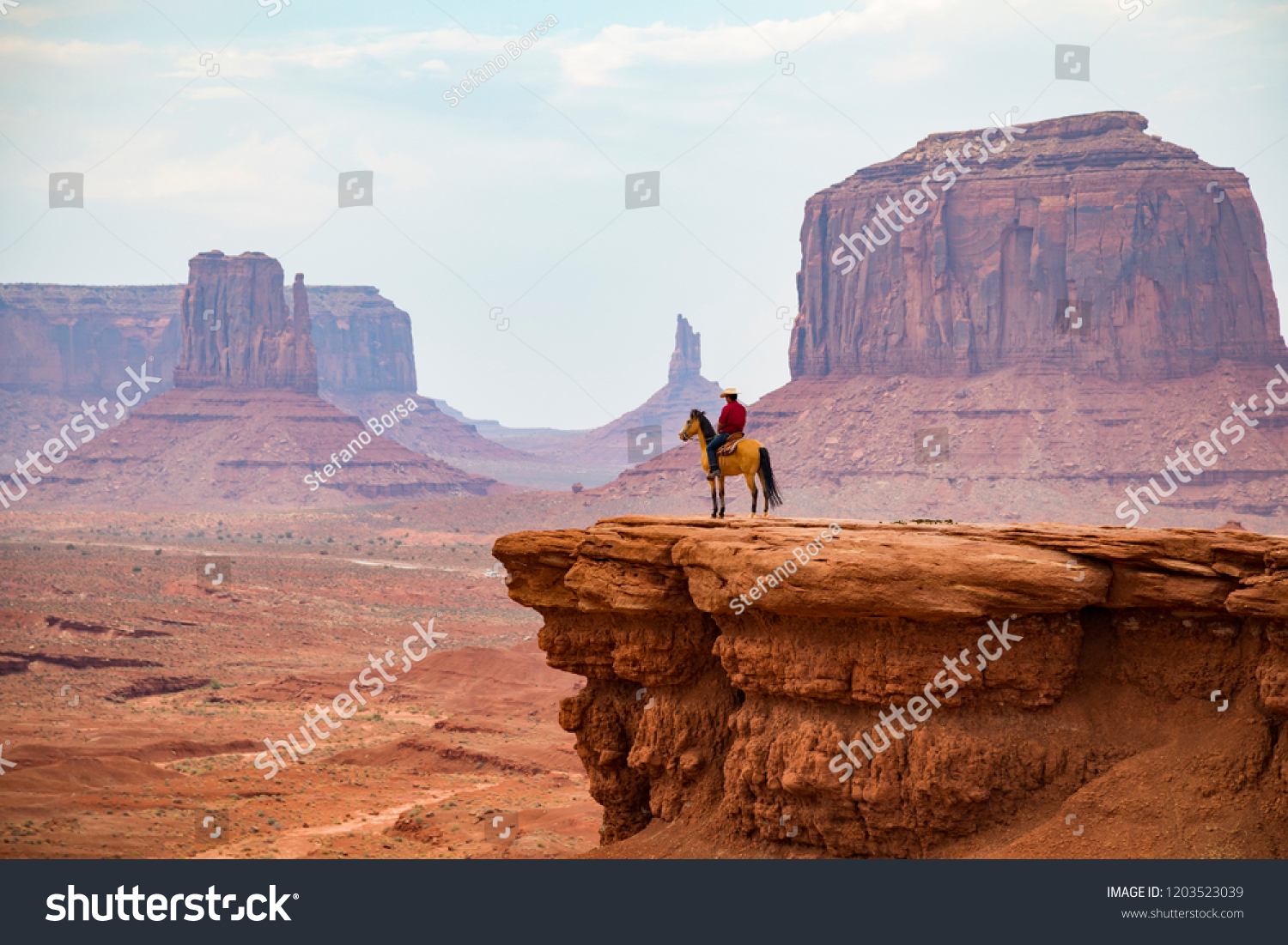 Cowboy looking at the horizon, Monument Valley Navajo Tribal Park #1203523039