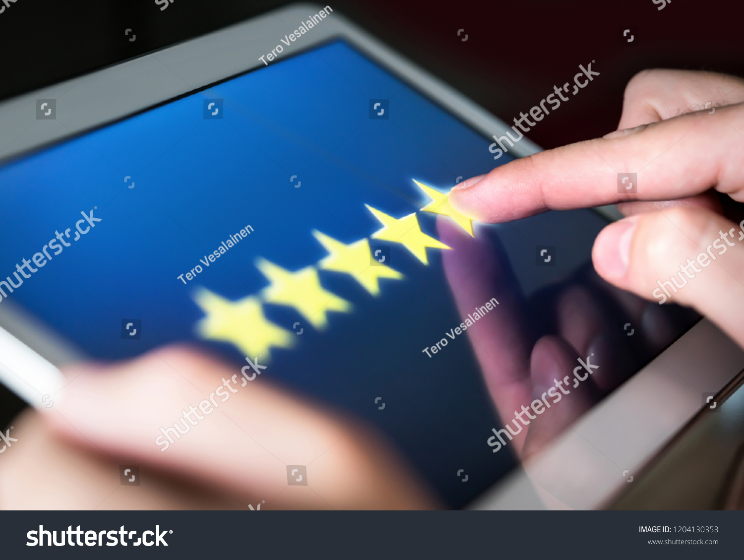 5 star rating or review in survey, poll, questionnaire or customer satisfaction research. Happy man giving positive feedback with tablet. Successful business with good reputation. Good experience. #1204130353