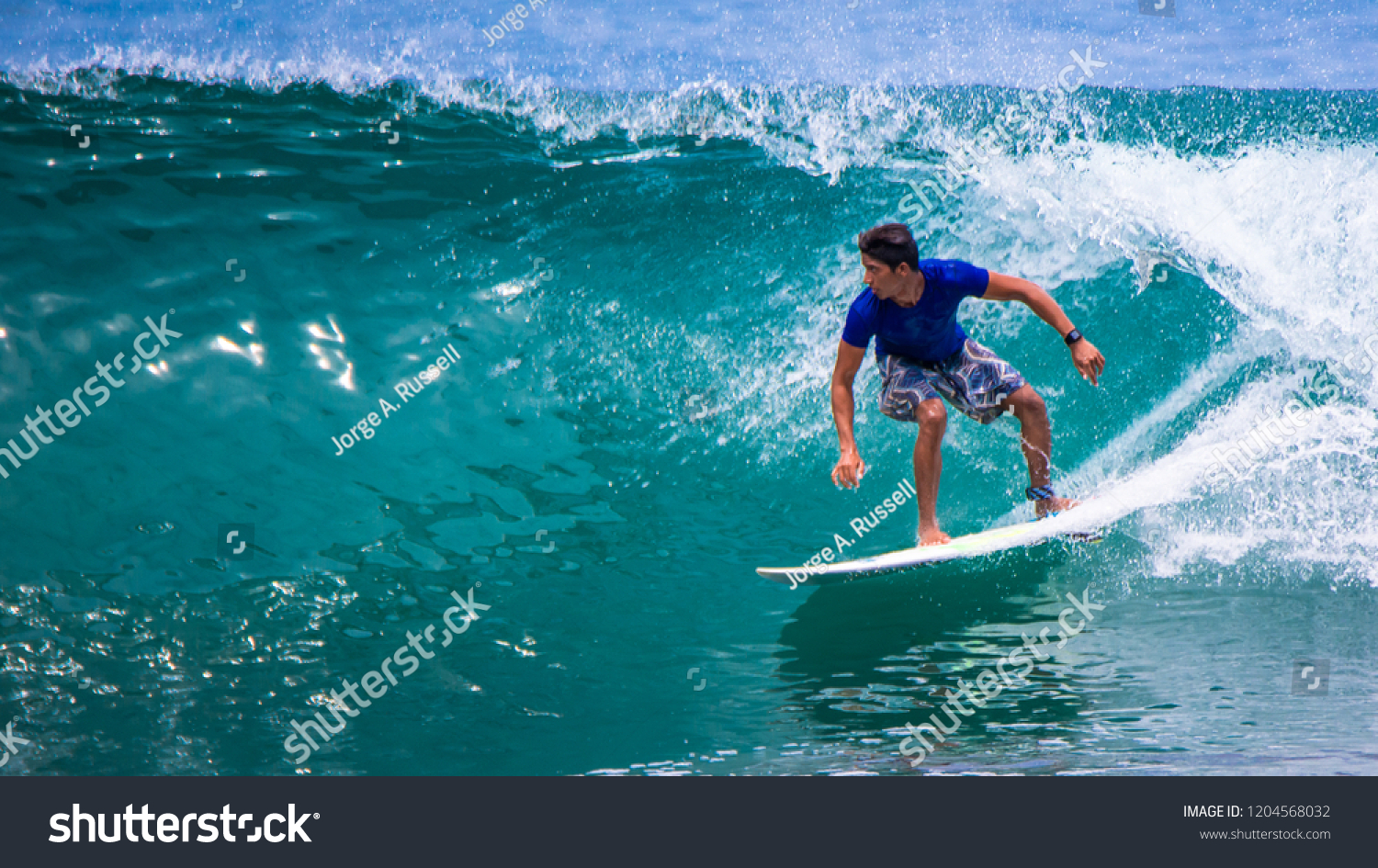 Riding the waves. Costa Rica, surfing paradise #1204568032
