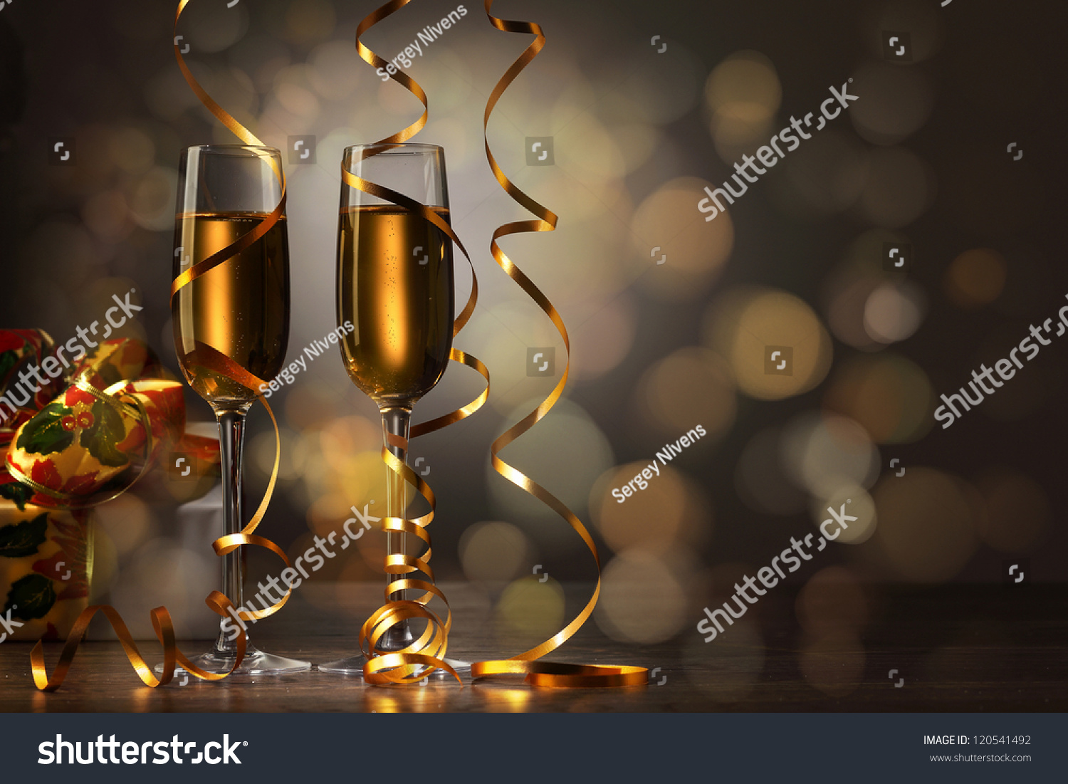Two champagne glasses ready to bring in the New Year #120541492