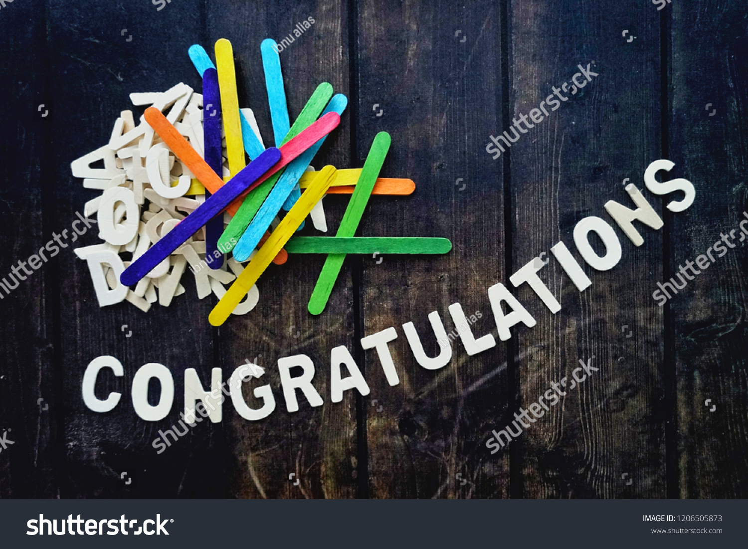 CONGRATULATIONS word by wood letters on wood background.  #1206505873