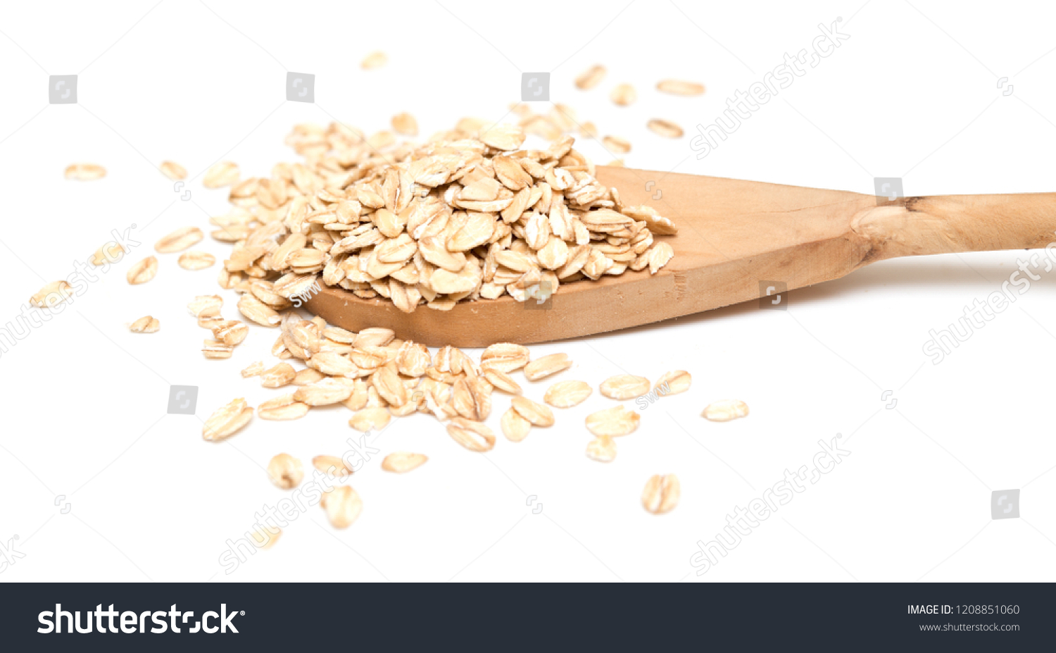 Oat flakes with wooden spoon on white background #1208851060