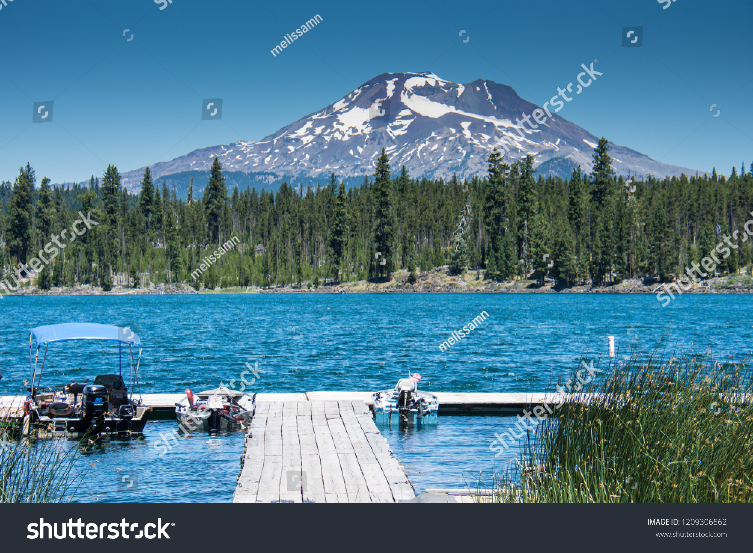 Lava Lake, along the Cascade Lakes Scenic Byway near Bend Oregon, with Mt. Bachelor in the backgrou #1209306562