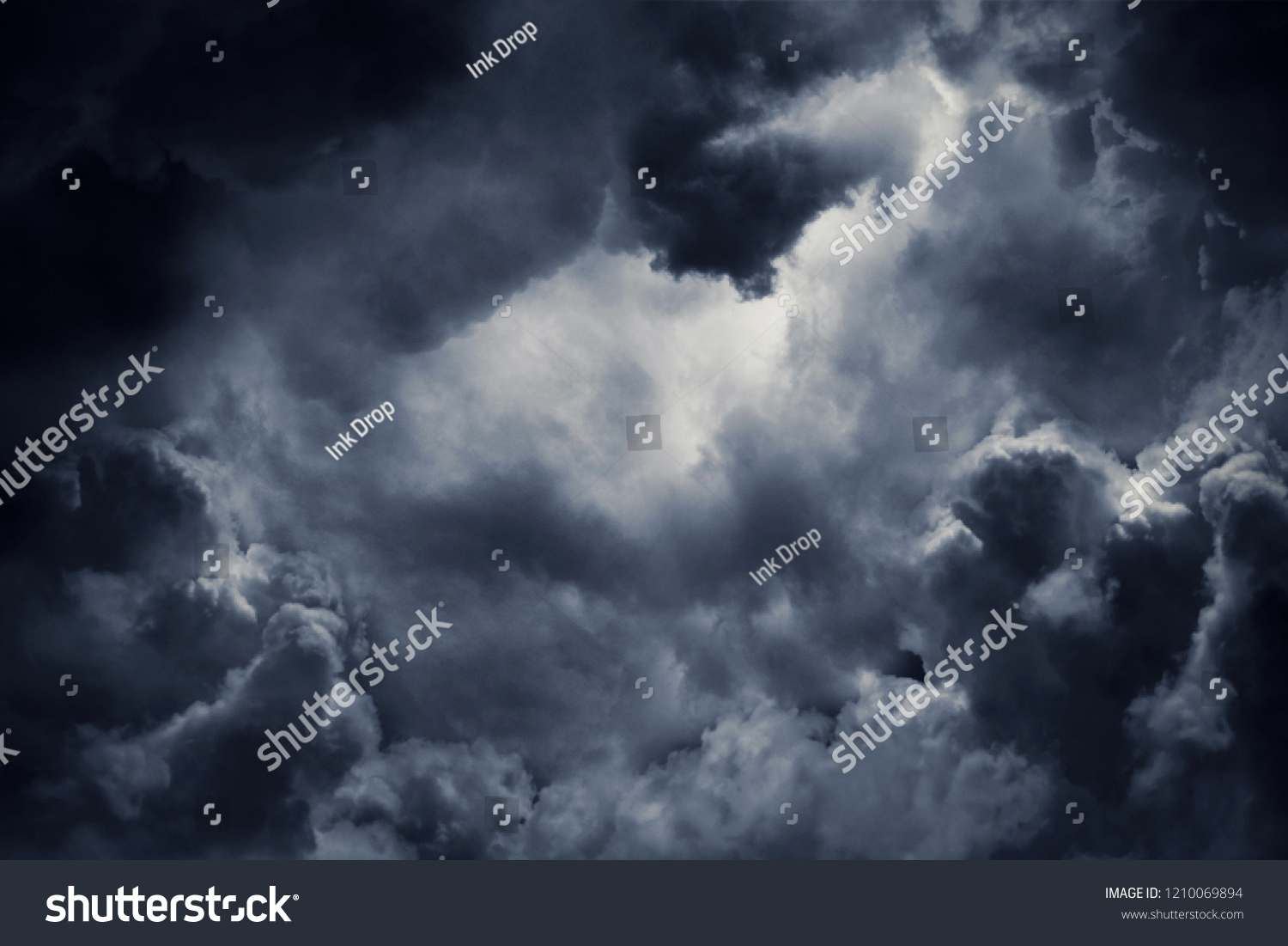 Dark moody storm clouds. Ominous warning. #1210069894