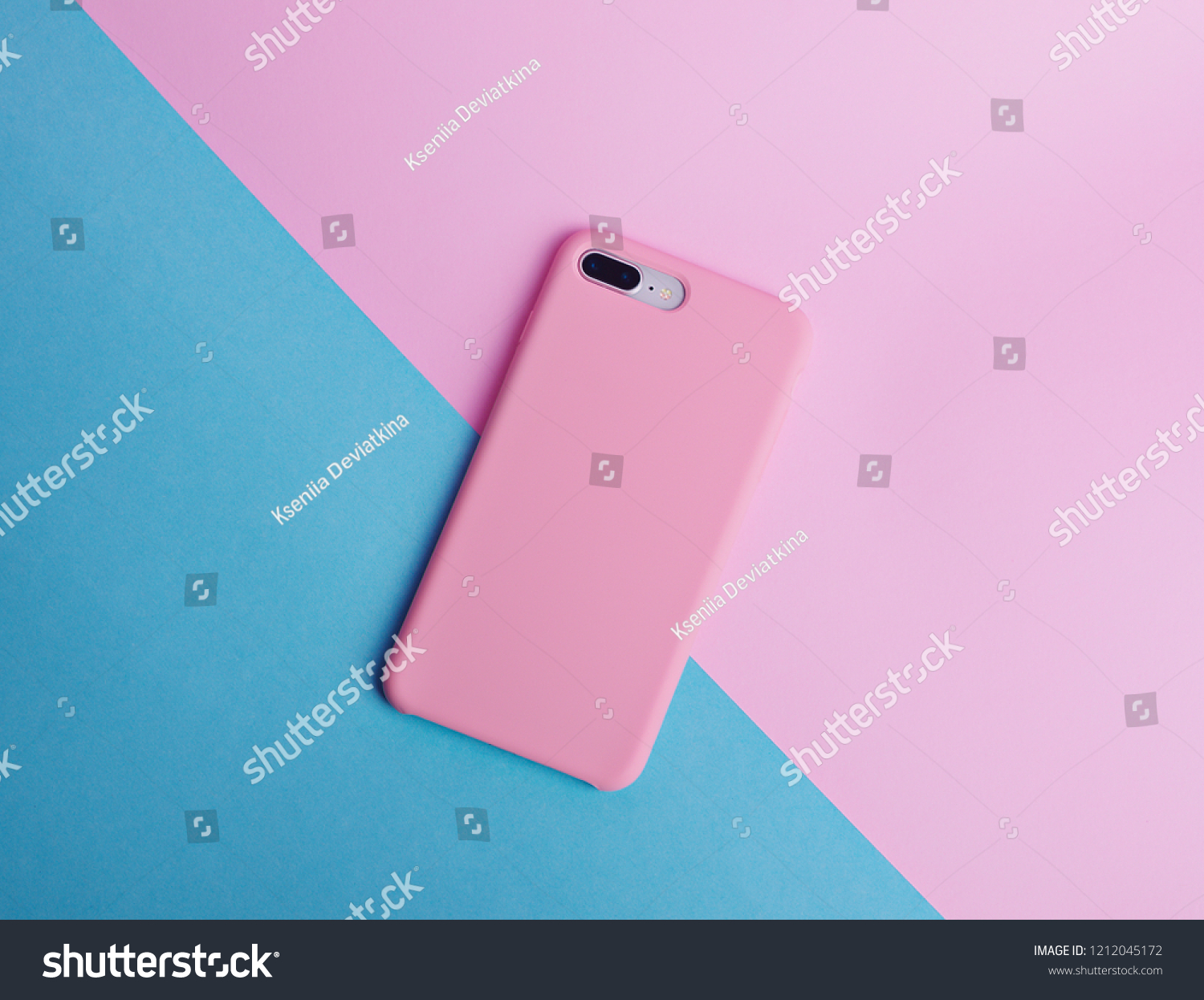 Pink phone case back view. Template of smart phone case. Blue and pink background #1212045172