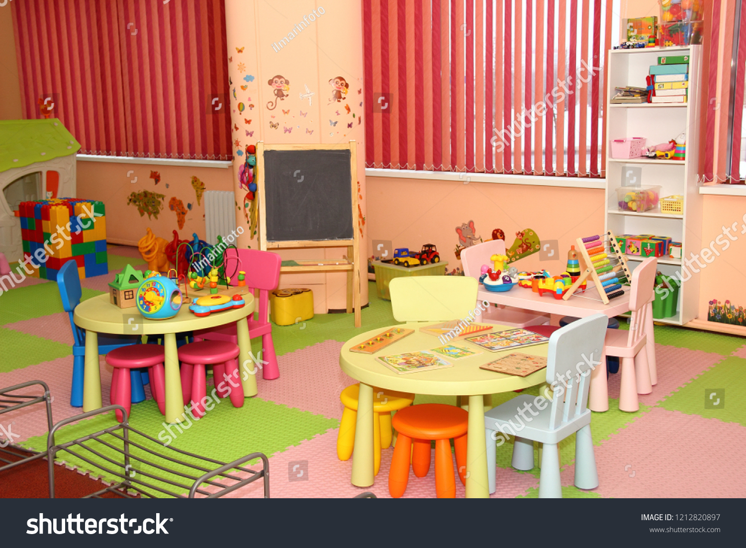 Interior of modern kids playing room in the kindergarten - children's entertainment, recreation, sports, educational games indoor #1212820897