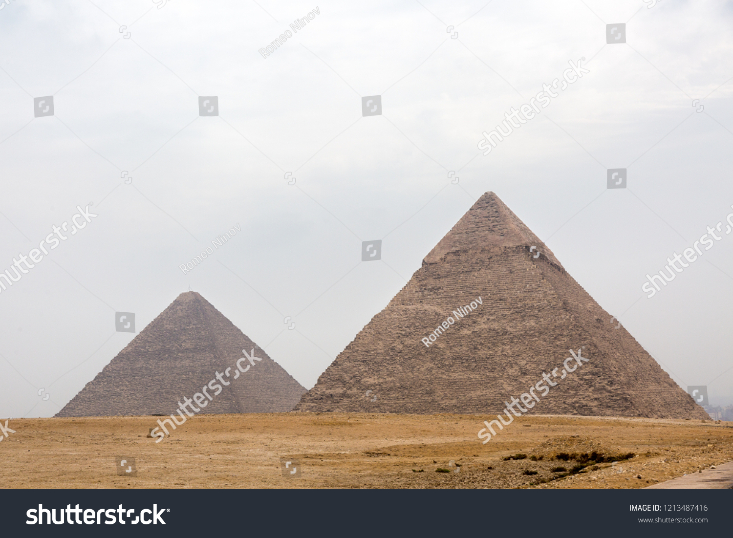 Pyramids and Sphinx in Giza #1213487416