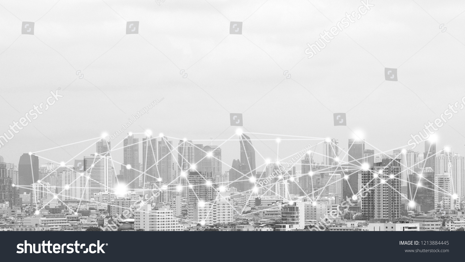 business connection in the city with digital graphic link network internet of things and information communication technology buildings black and white background #1213884445