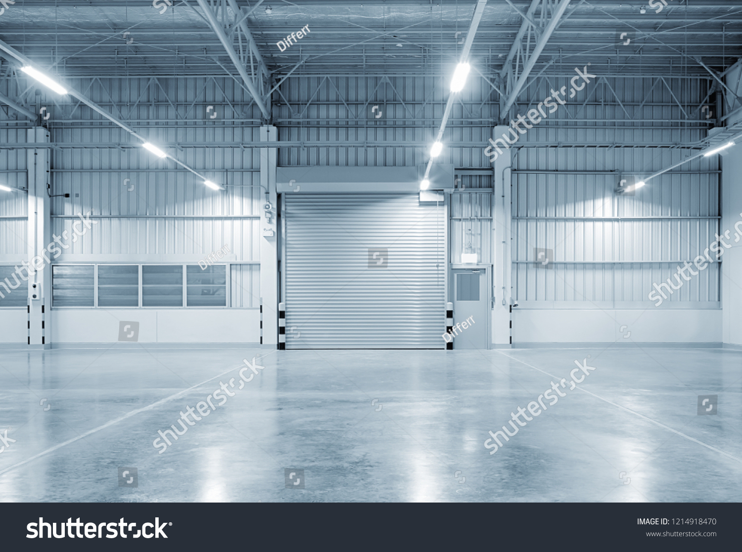 Roller door or roller shutter using for factory, warehouse or hangar. Industrial building interior consist of polished concrete floor and closed door for product display or industry background. #1214918470