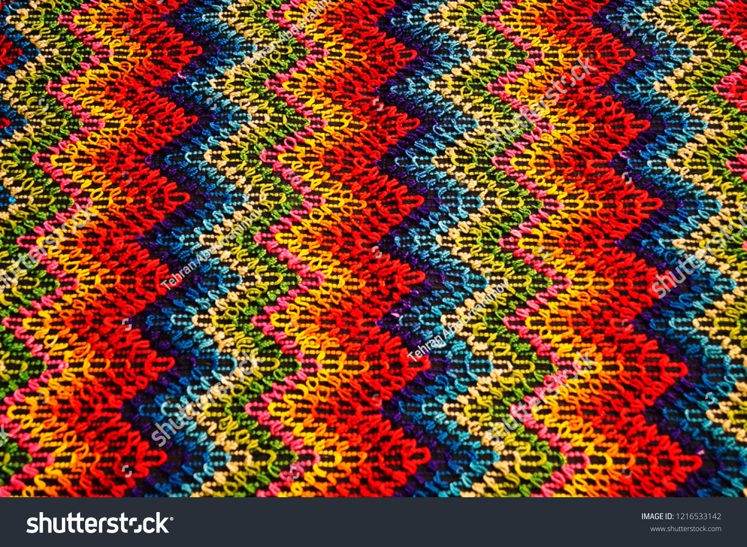 Multicolored zigzag patterns on traditional shawl in Moldova			 #1216533142