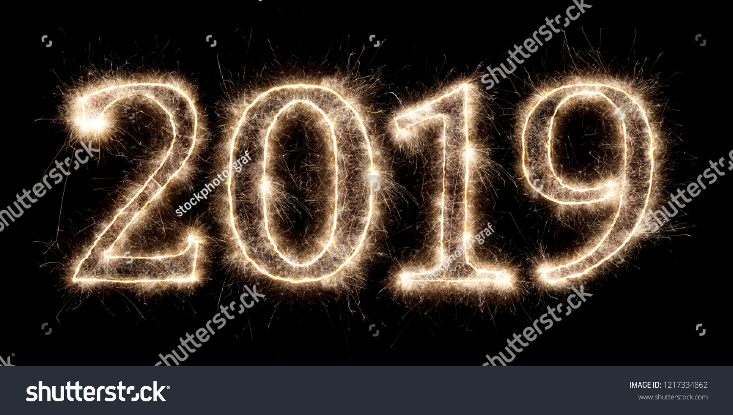 bright sparkler pyrotechnic fireworks number 2019 happy new year sylvester concept isolated on black background #1217334862