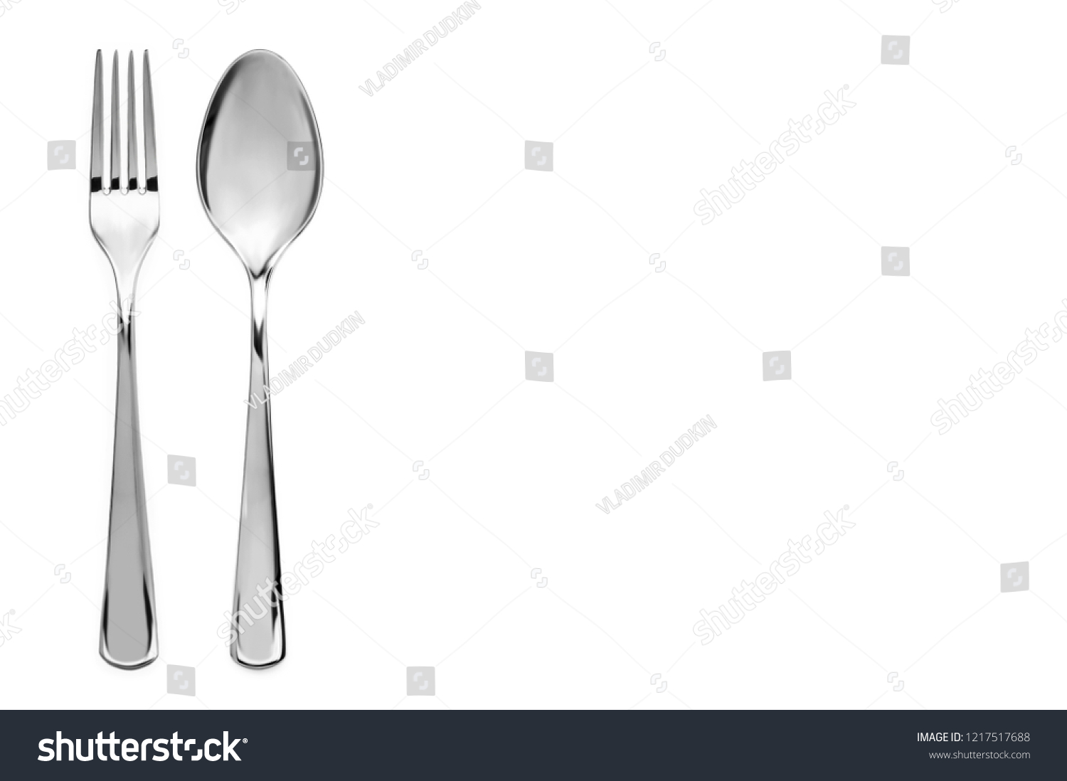 A top down view on a cutlery in white background #1217517688