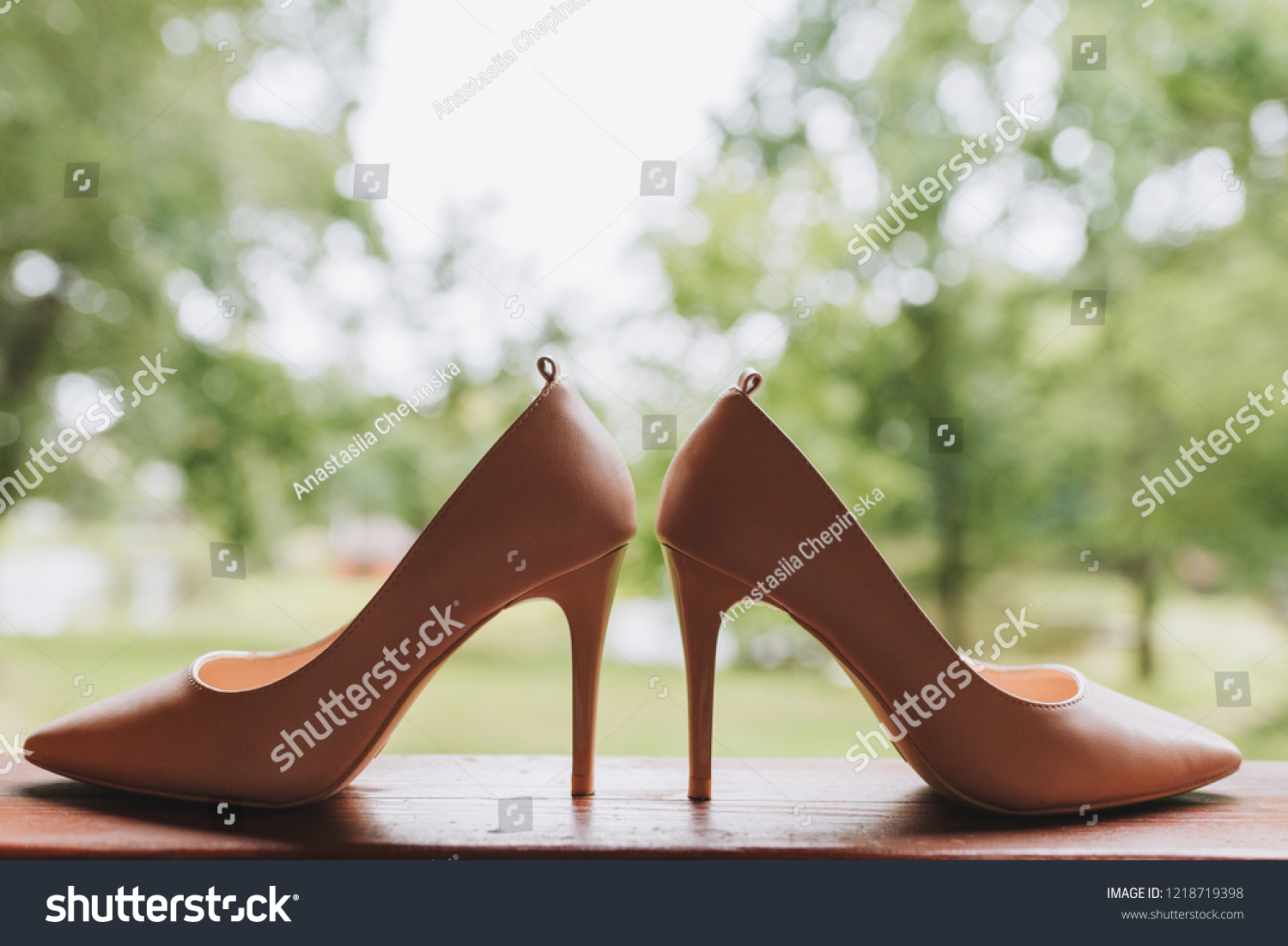 Pair of simple elegant high heeled shoes #1218719398