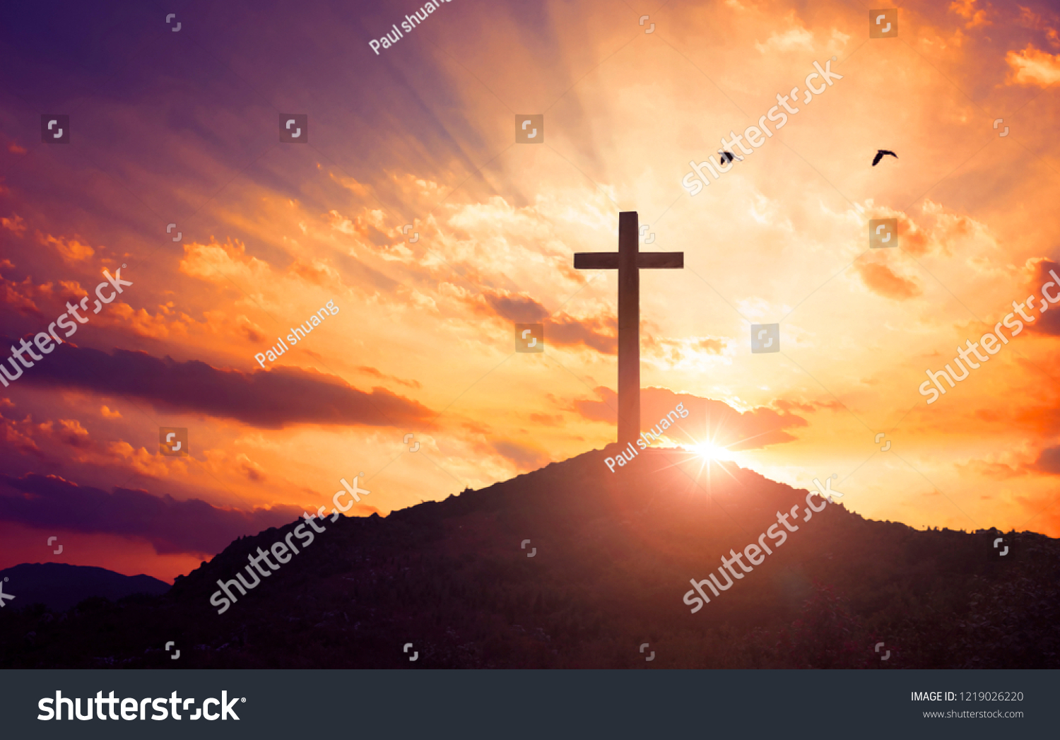 Christmas concept: Crucifixion Of Jesus Christ Cross At Sunset #1219026220