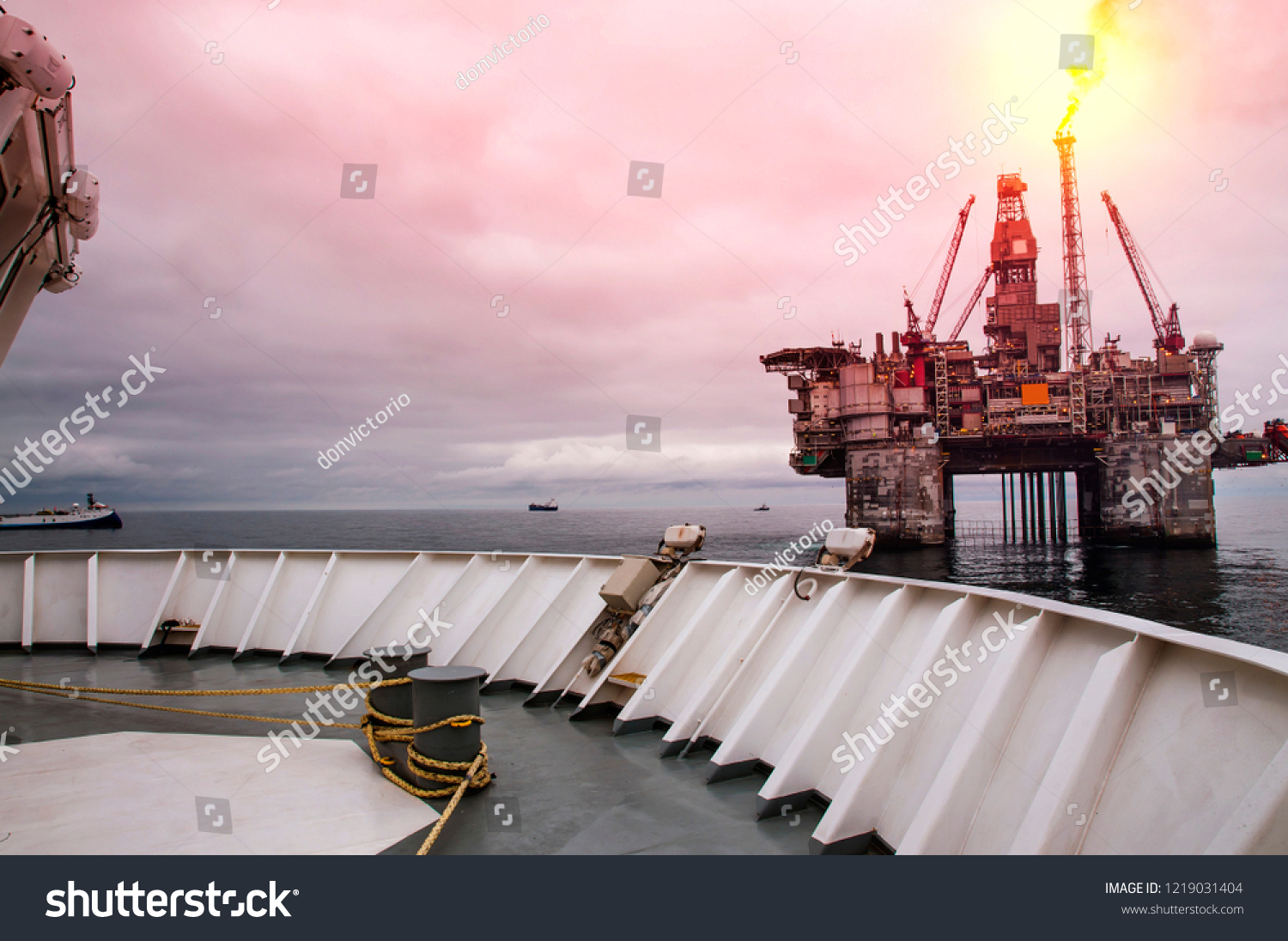 Platform support vessels and seismic boats at close distance to Norwegian Drill Rig on North Sea #1219031404