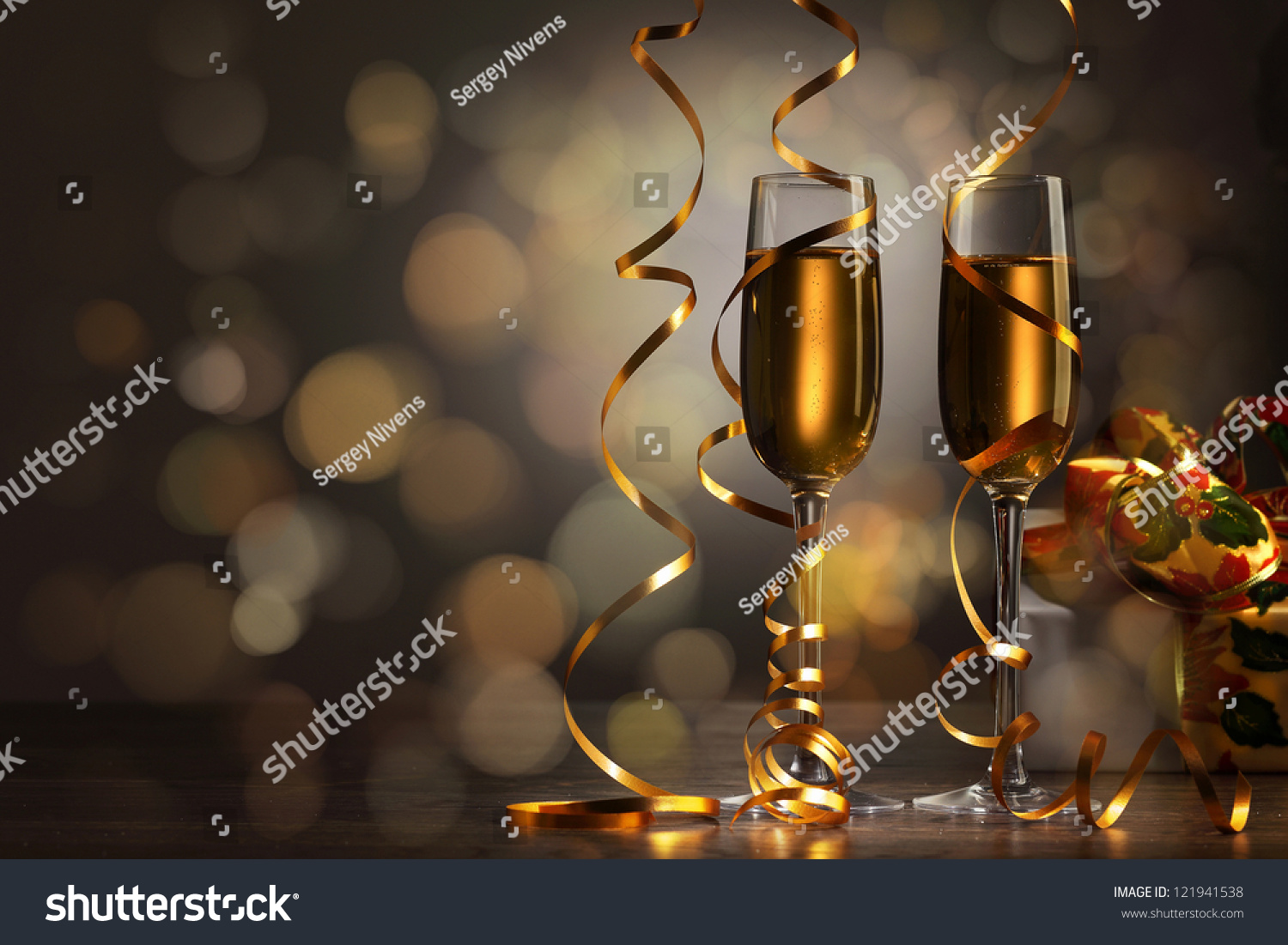 Two champagne glasses ready to bring in the New Year #121941538