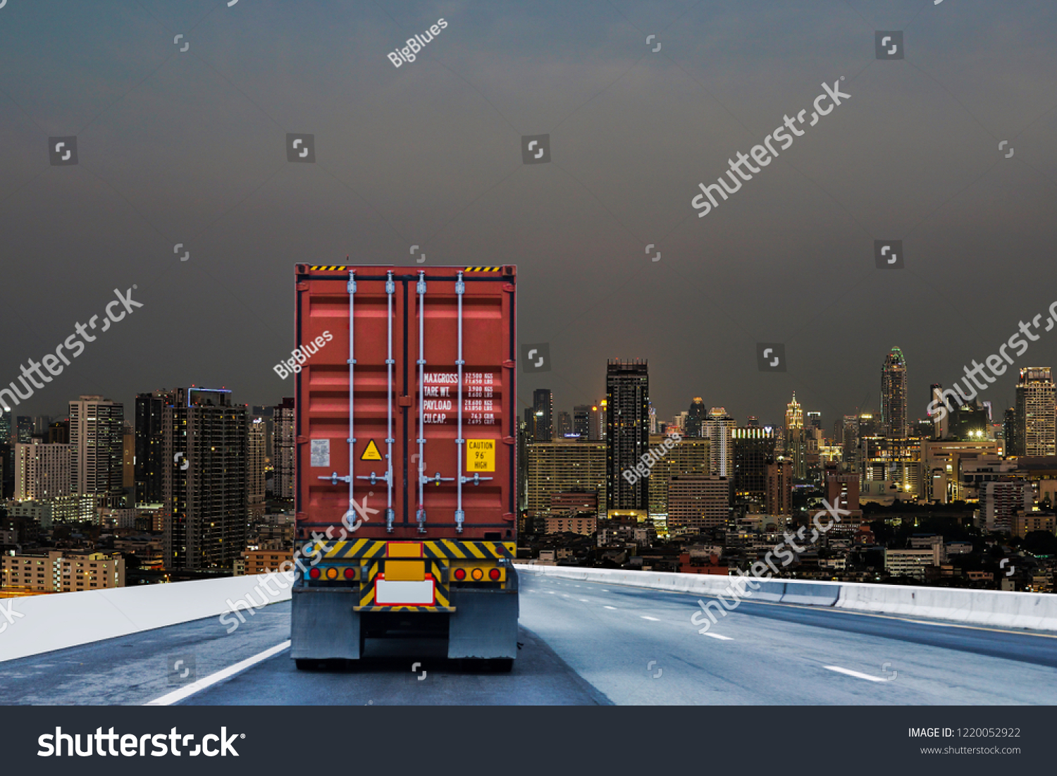 Truck on road with red container, transportation concept.,import,export logistic industrial Transporting Land transport on the expressway driving to Night City  #1220052922