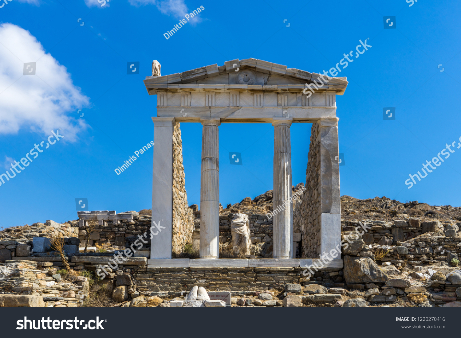 The ancient monuments and ruins on the sacred island of Delos, Greece. The birth place of god Apollo.  #1220270416