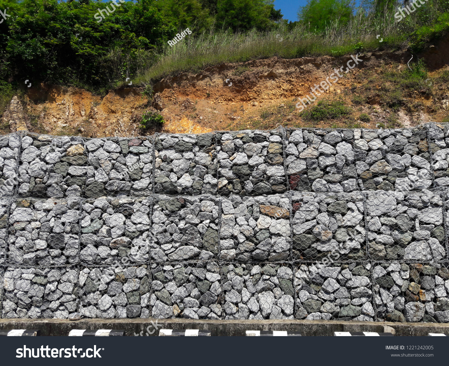 The wall protects from the erosion of rocks on the slopes. (ROCK SLOPE STABILIZATION) #1221242005