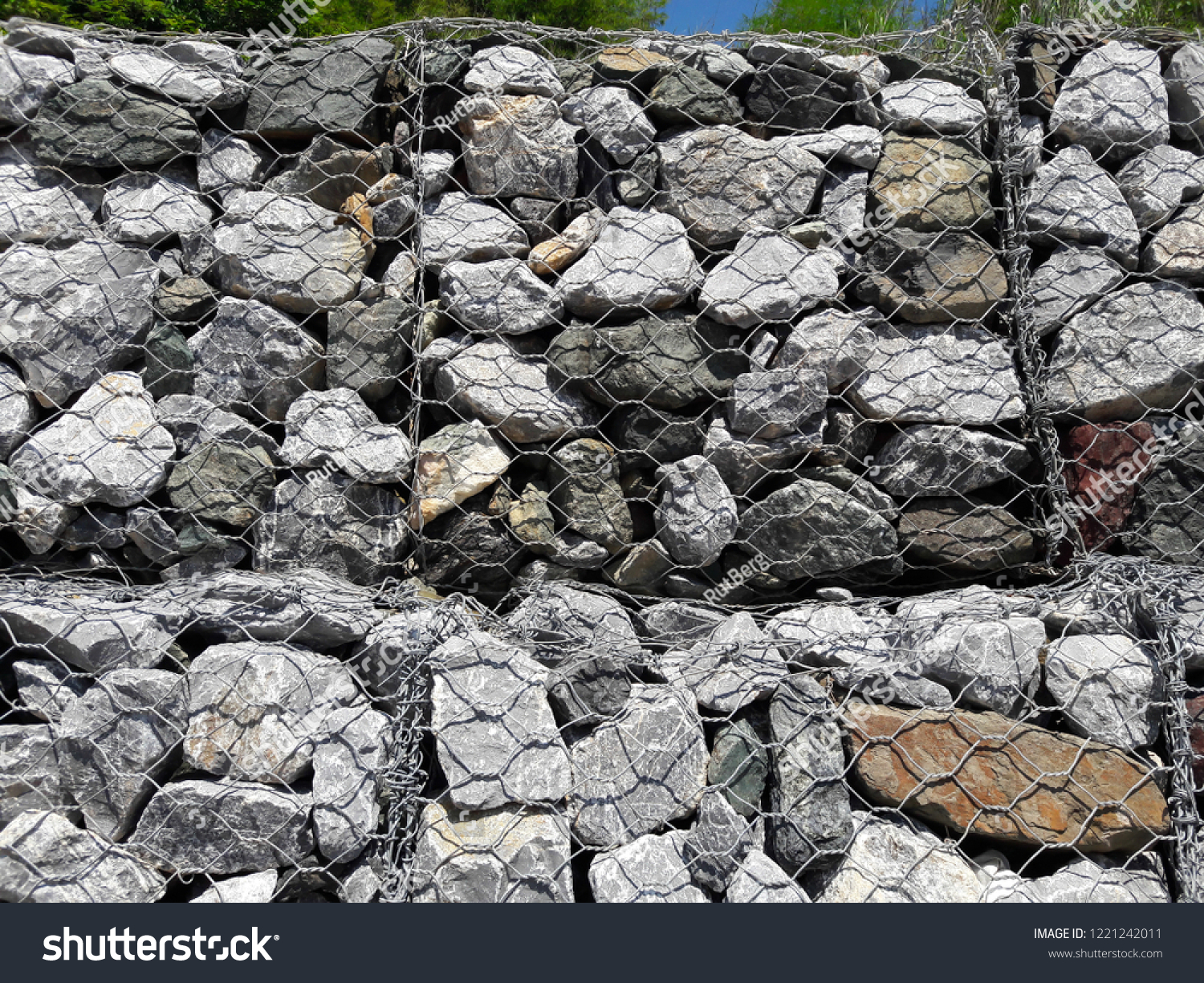 The wall protects from the erosion of rocks on the slopes. (ROCK SLOPE STABILIZATION) #1221242011