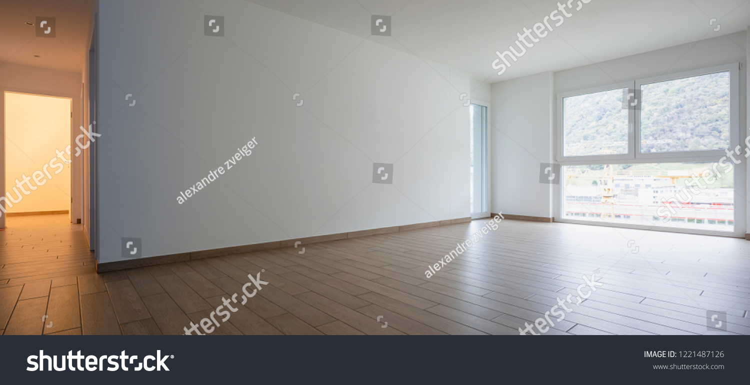 Living room with window and corridor. Nobody inside #1221487126