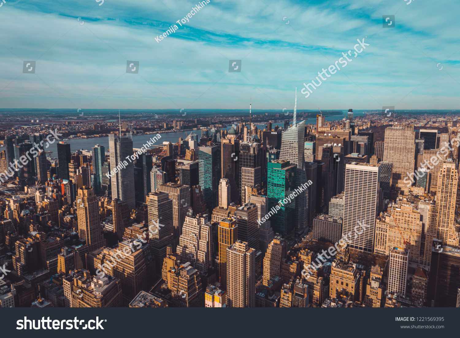 Aerial View over New York City at Sunny Day #1221569395