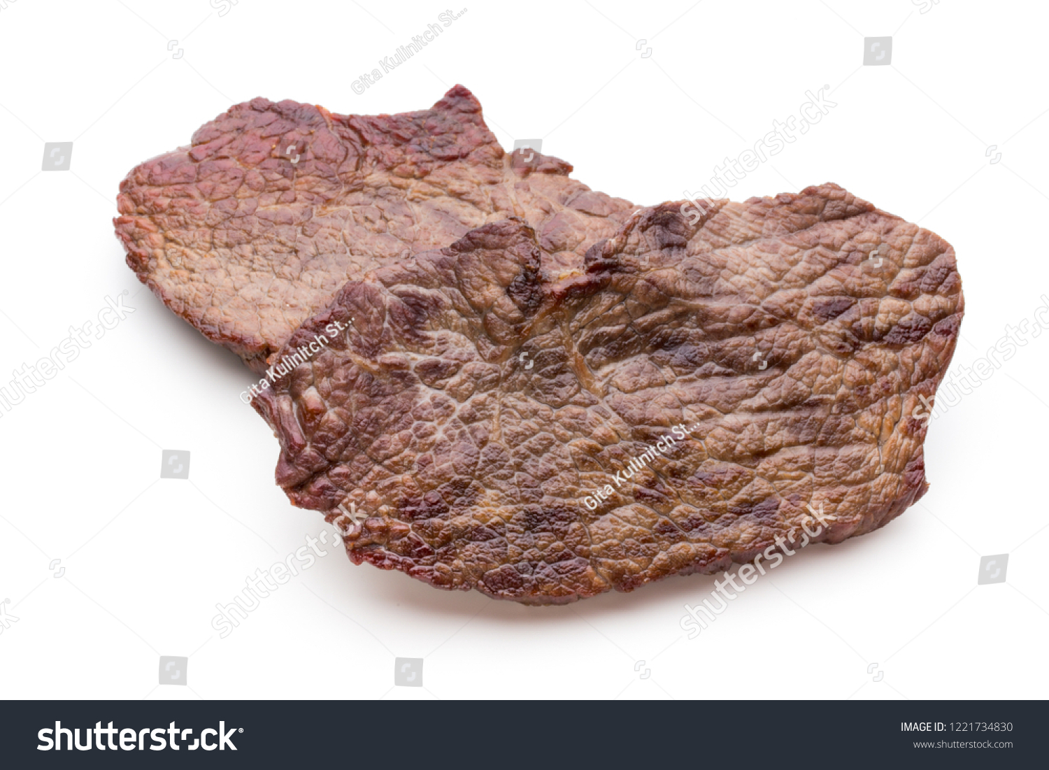 Grilled bio beef steaks with spices isolated on white background. #1221734830