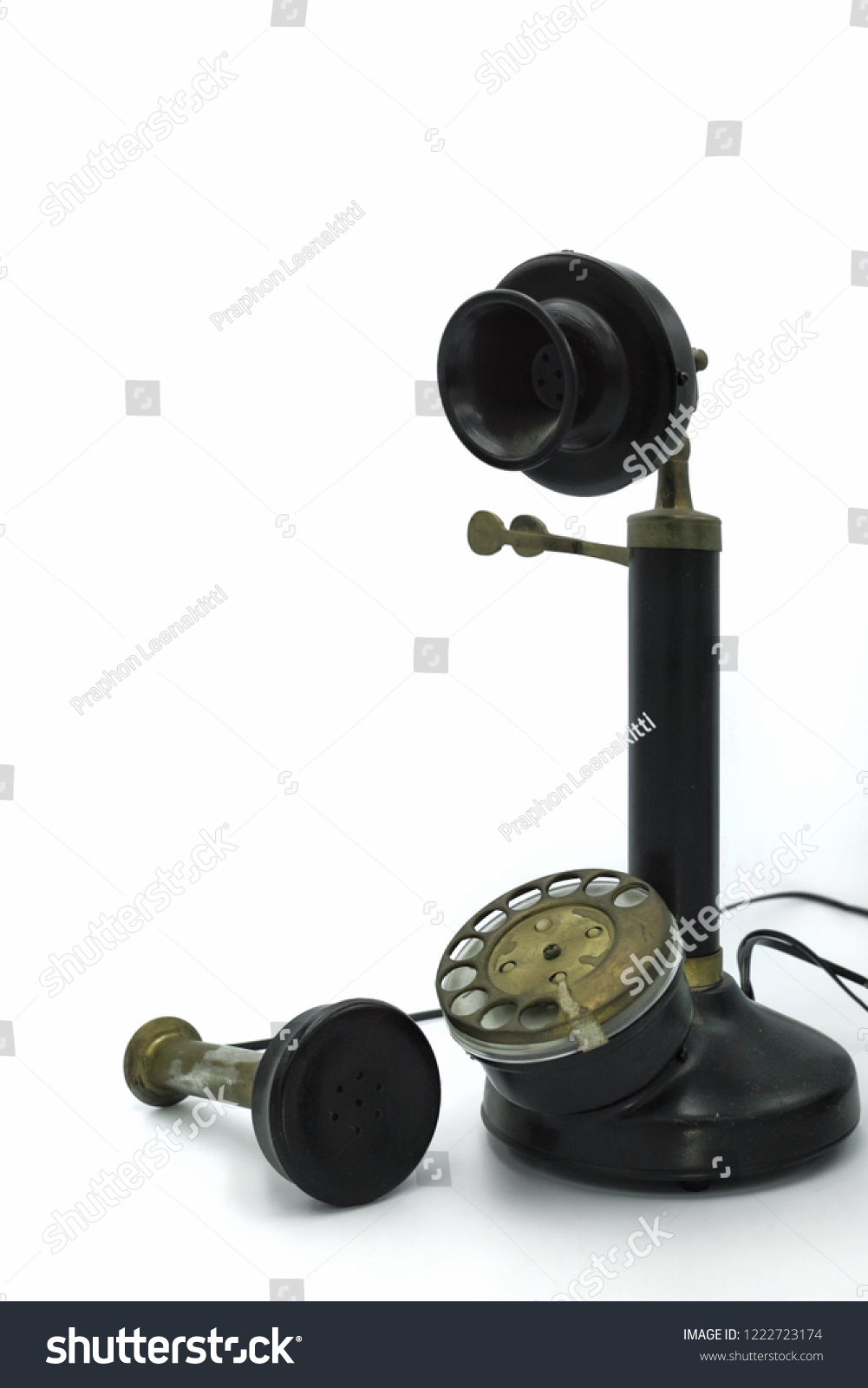 The replica of candlestick telephone. Candlestick telephone is a vintage telephone that was used very long time ago also calls as a desk stand phone, an upright, or a stick phone. #1222723174