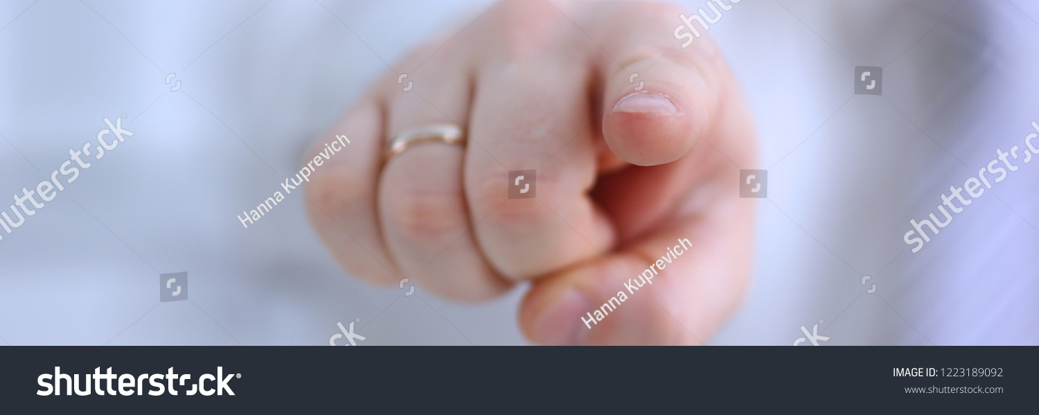 Male arm point forefinger to you or camera during conference conversation in office closeup. Suggestion illustrate offer proposition bribe demand boss advisor idea concept #1223189092