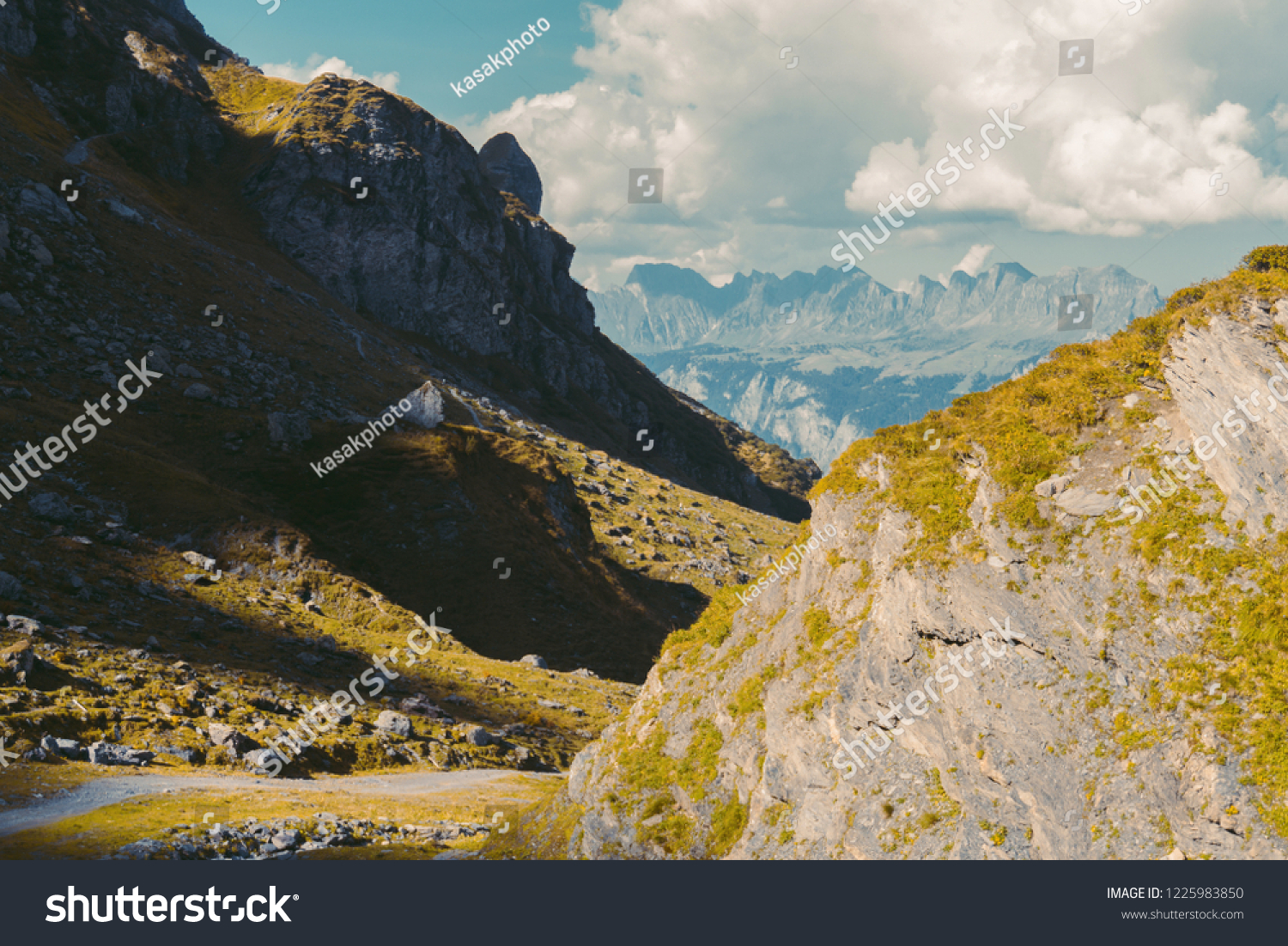 Beautiful panoramic nature in the mountains, the miracle of nature. Autumn mood at sunset in Switzerland mountains Pizol, Europe #1225983850