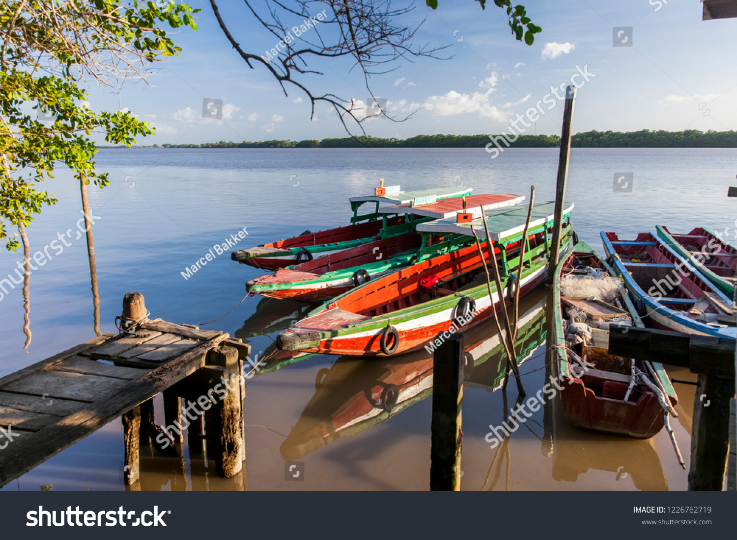 Colorful traditional boats on the Suriname river, Suriname #1226762719