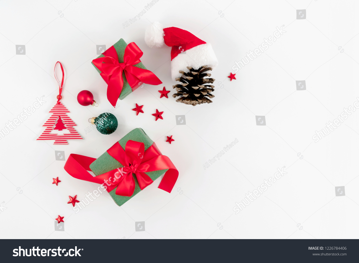 Christmas trendy composition. Xmas red and green decorations on white background. Christmas, New Year, winter concept. Flat lay, top view, copy space #1226784406