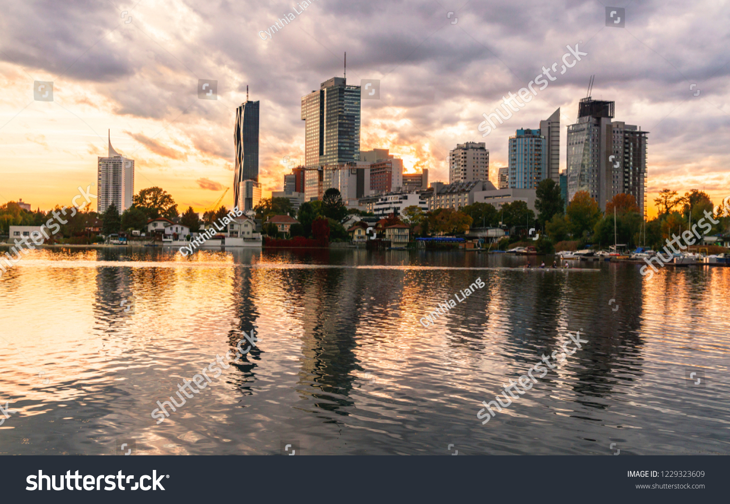 Vienna, Austria - October 11, 2017: Gorgeous sunset reflection of Vienna on the Danube River. #1229323609