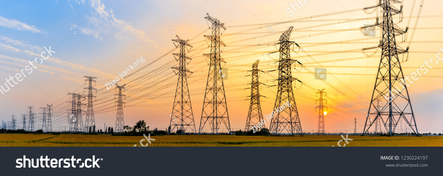 high-voltage power lines at sunset,high voltage electric transmission tower #1230224197