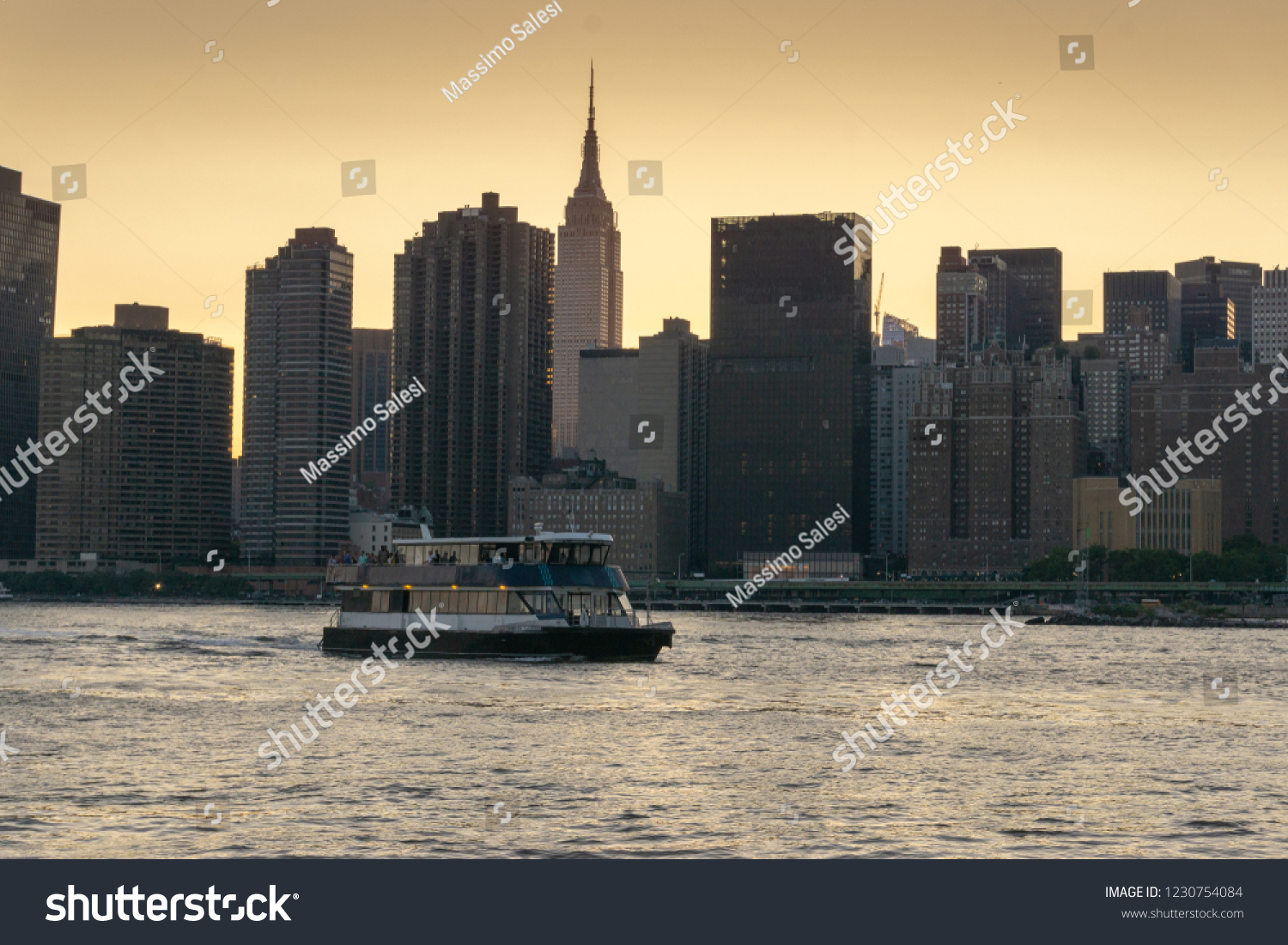 Manhattan Midtown skyline panorama at sunset. New York #1230754084