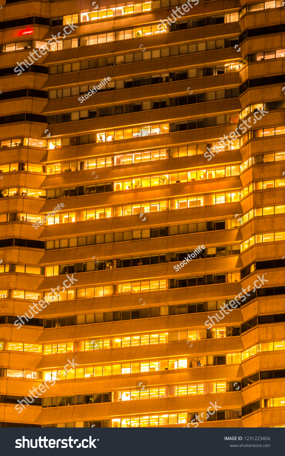 Beautiful exterior building and architecture of building with window and light pattern at night #1231223404