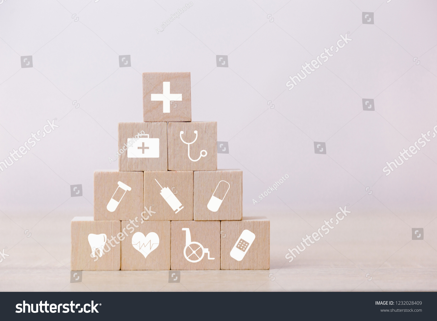 Health Insurance Concept,hand arranging wood block stacking with icon healthcare medical. #1232028409