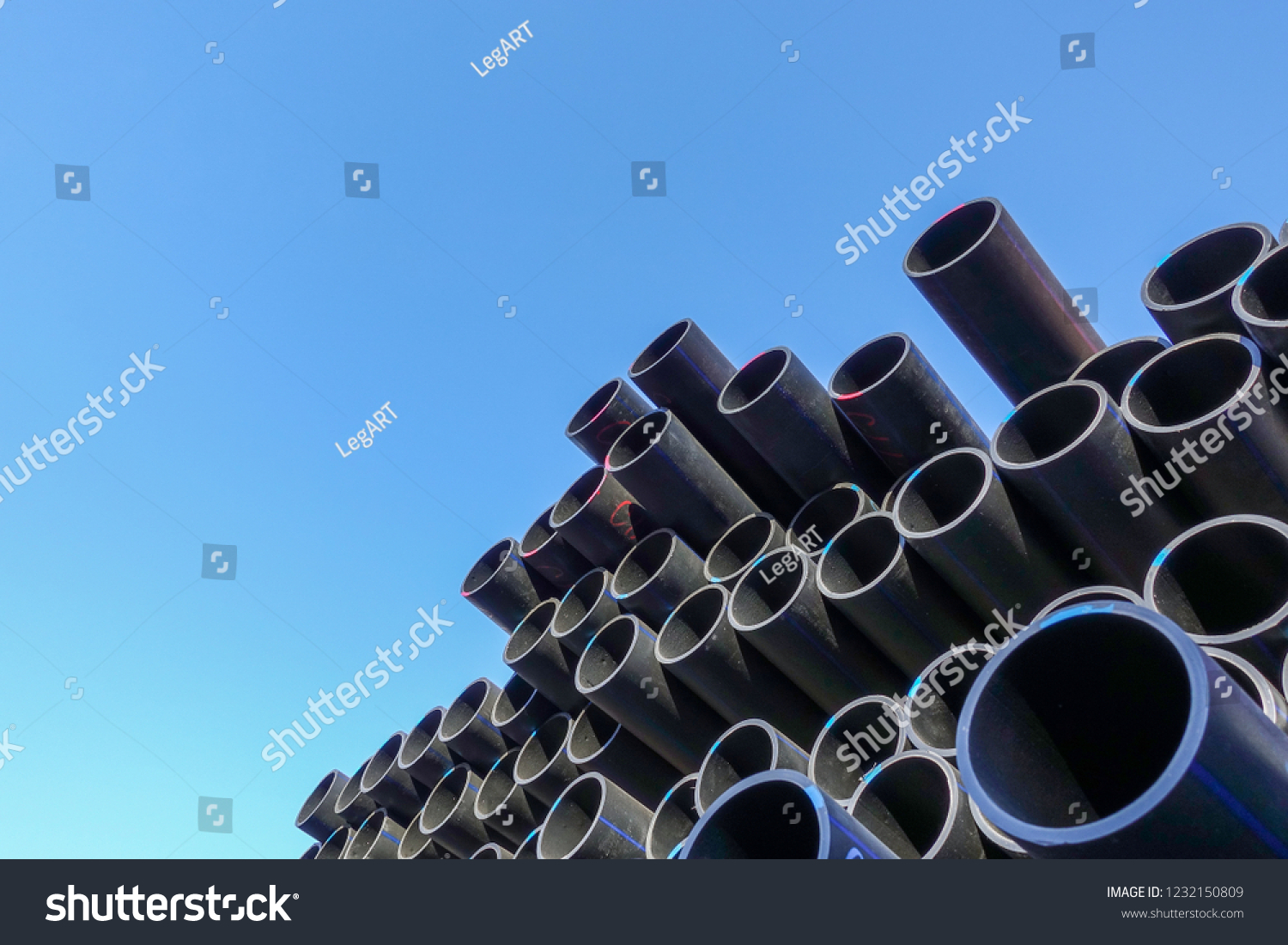 Plastic pipes in stock of finished products stacked in packs #1232150809