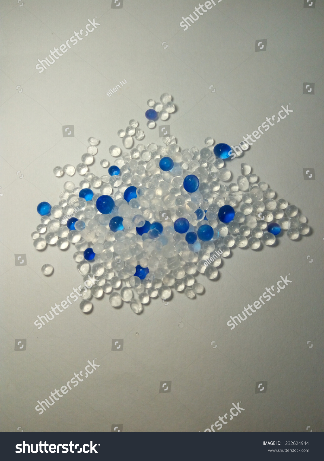 Blue and  white  silica gel desiccant abstract background #1232624944