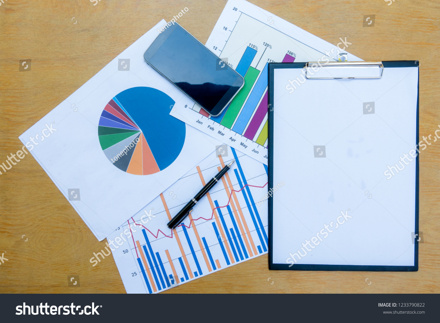 Company analyzes the company's annual financial statements, balances work with graphical documents. Economic picture, project, market, finance and tax office #1233790822