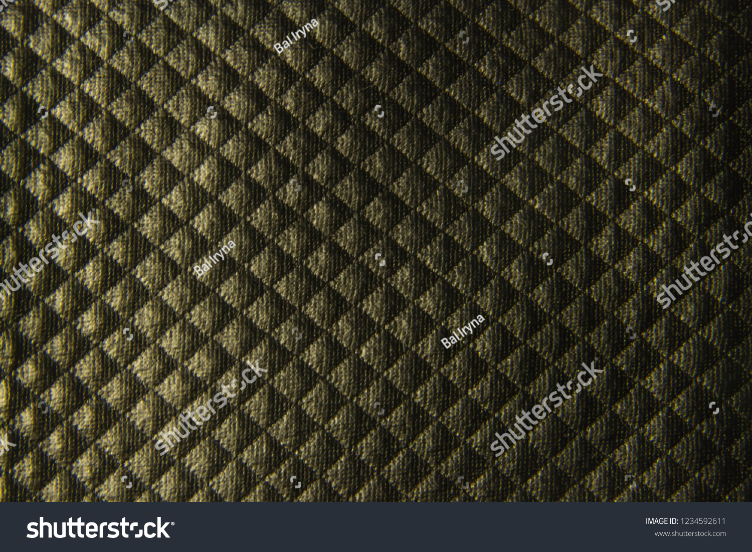 Black textured leather background with rhombuses closeup #1234592611