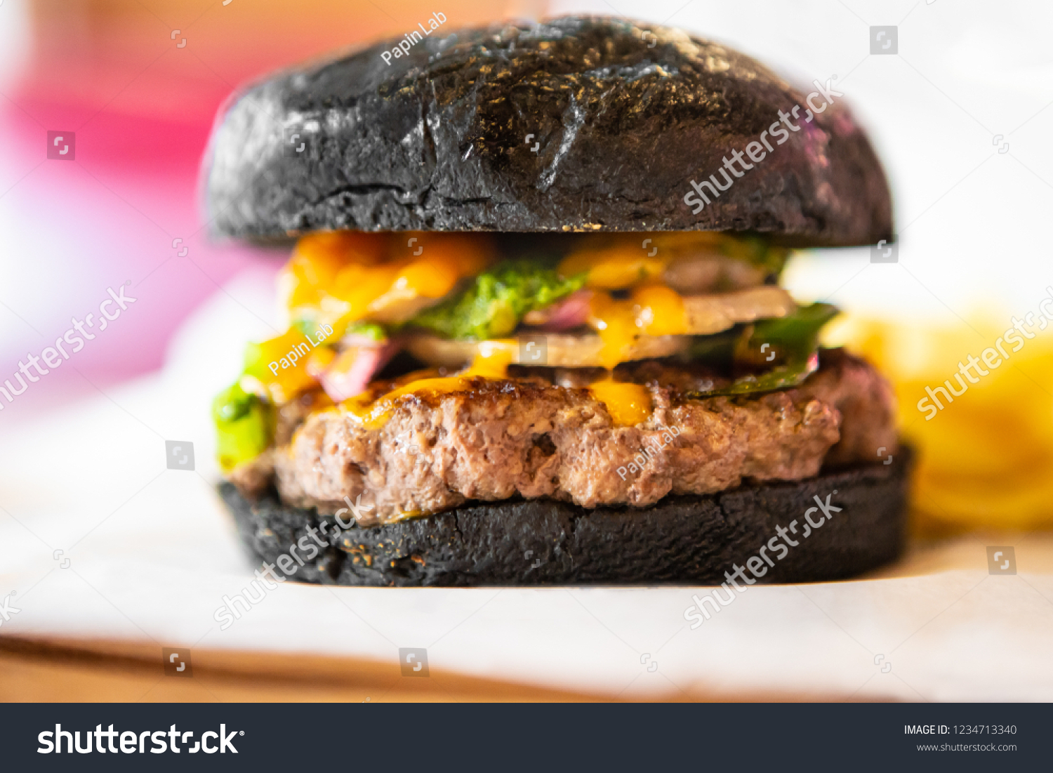 Big Black Tasty Sandwich - Hamburger Or American Burger With Beef, Pickles, Tomato And Sauce On Table. Concept Fast And Unhealthy Food, Unhealthy Eating. #1234713340